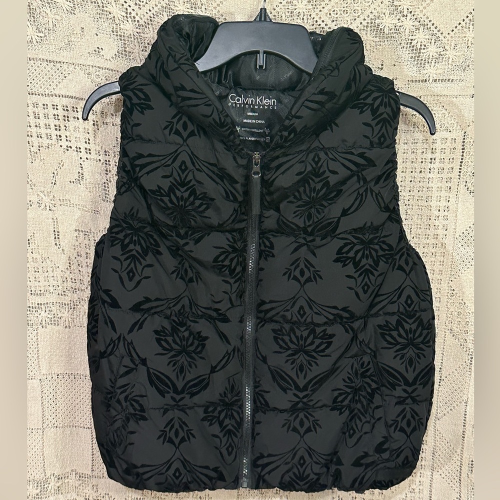 Calvin Klein black performance puffer vest water repellent stowaway hood…